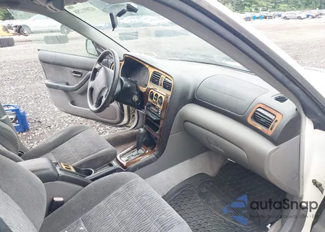 2000 Subaru Outback z USA, uszkodzony, nr VIN 4S3BH6652Y7633304